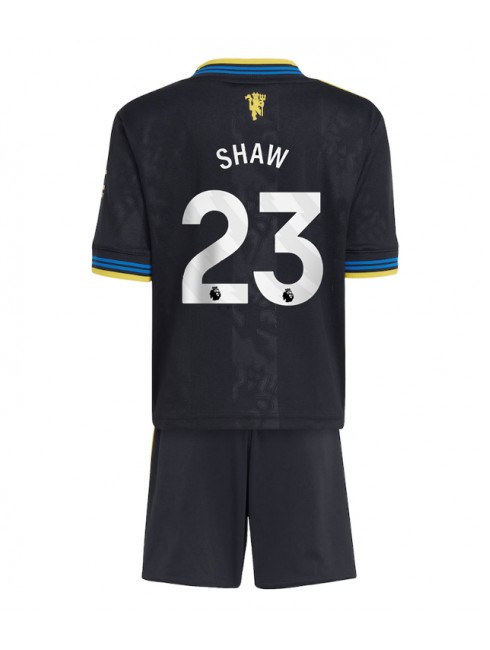 Otroški Nogometna dresi kompleti poceni Manchester United Luke Shaw #23 Tretji 2025-26